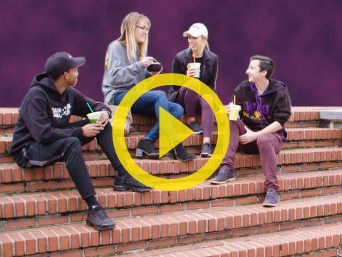 students sitting on stairs
