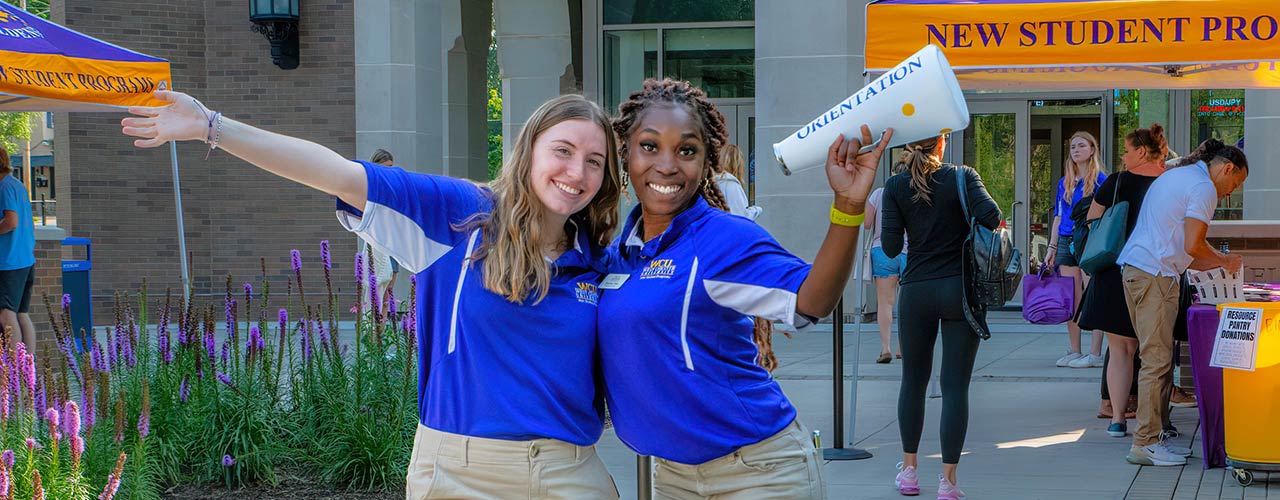 OL giving orientation directions orientation leaders with megaphone