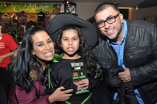 Sensory music event photo with a young child with two adults