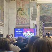 Thumbnail: Inside musuem showing a promotional screen for IRAN