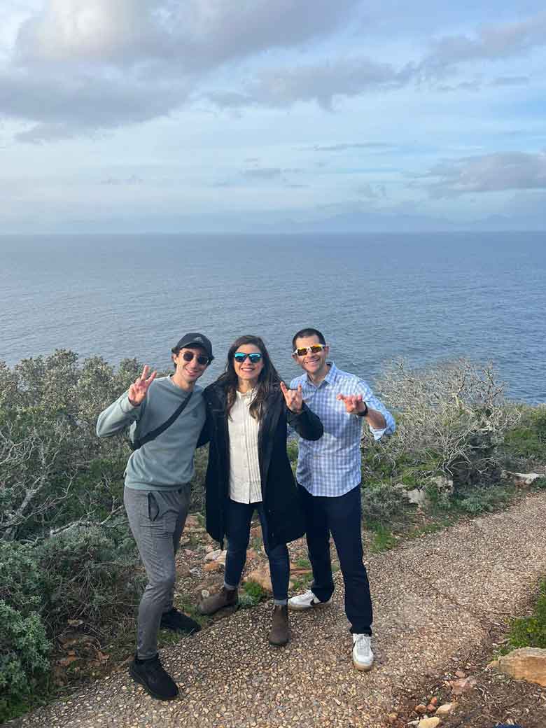 Group posing with ramsup hand sign