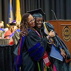Graduate commencmenet thumbnail image 1