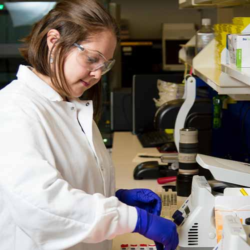 Lab worker in white coat