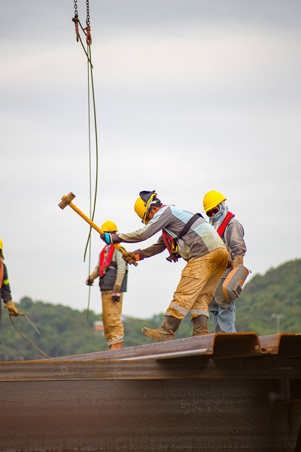 Workers with hammer