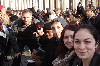 Di Giovine and students taking notes at Papal Audience