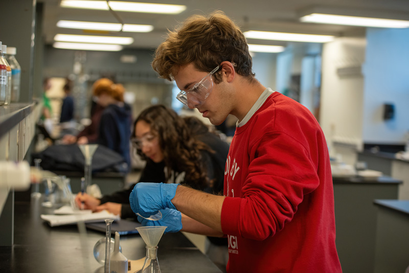 WCU Chemistry Student working in the Lab on a chemistry project
