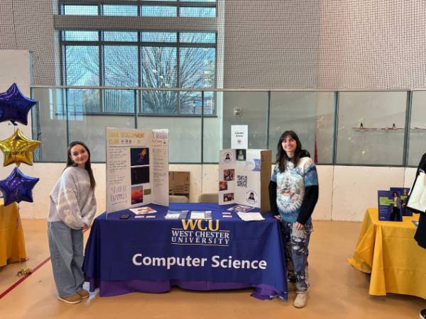 Students at Table Golden Visit Event