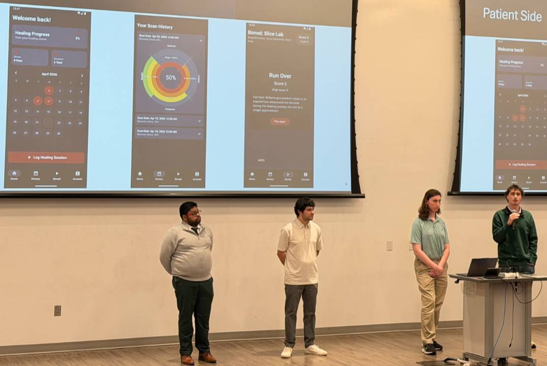 Students presenting on stage