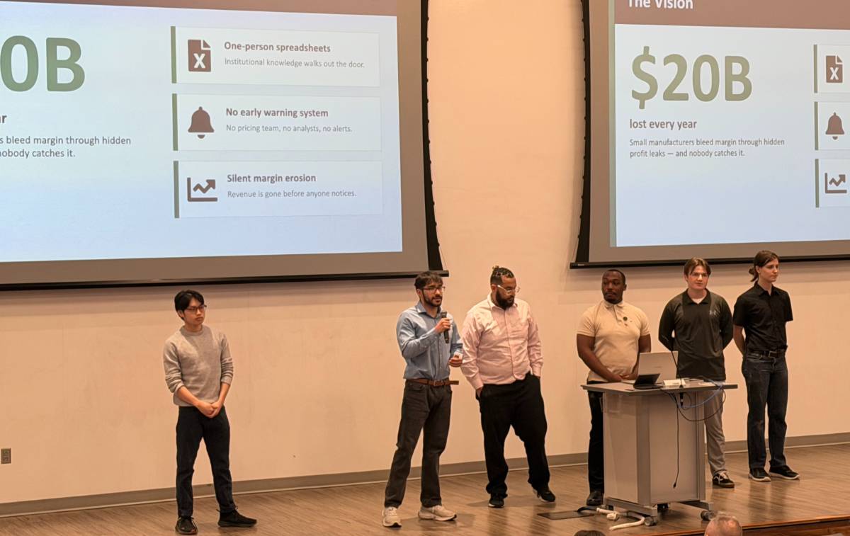 Students on stage presenting