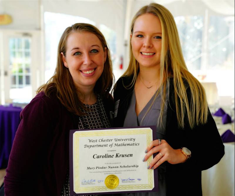 Dr. Emily Miller presenting the Mary Pinder Nunan ’43 Scholarship to Caroline Krusen