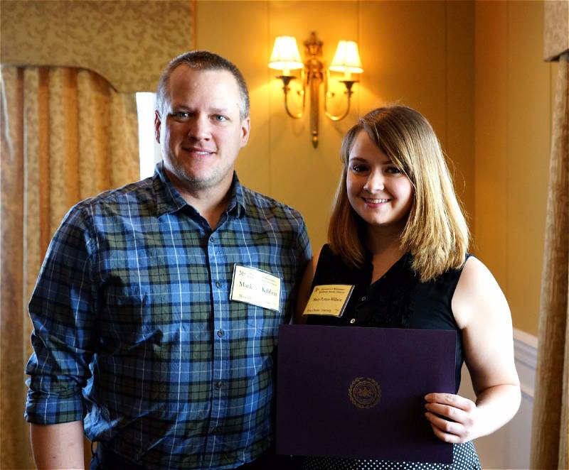 Stacy A. Porten-Willson receiving her award