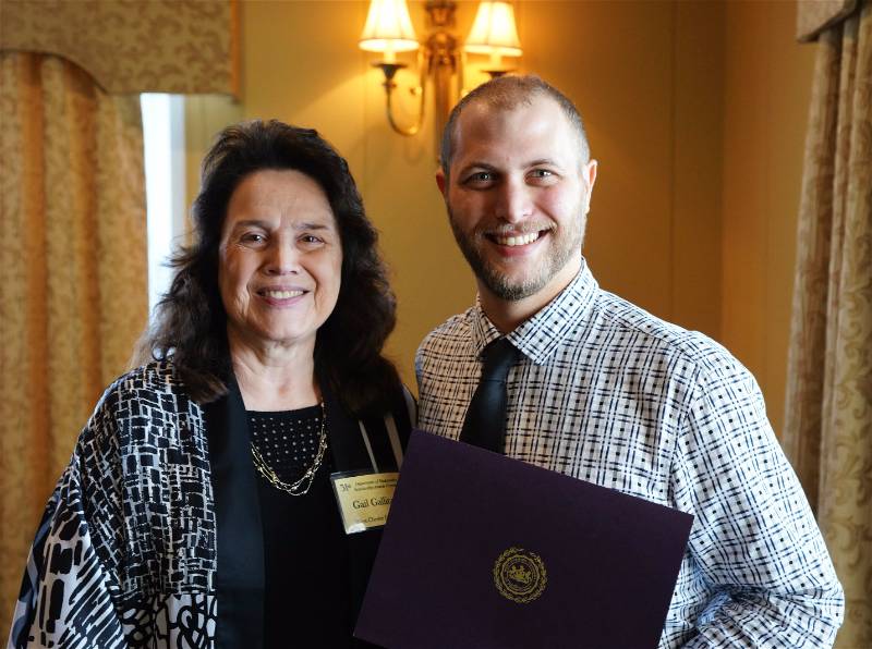Daniel Rizzo receiving his award