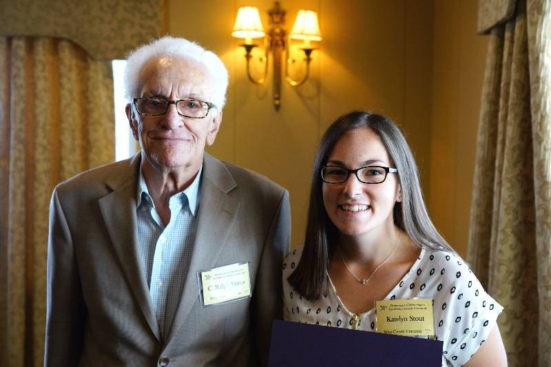 Katelyn Stout receiving her award