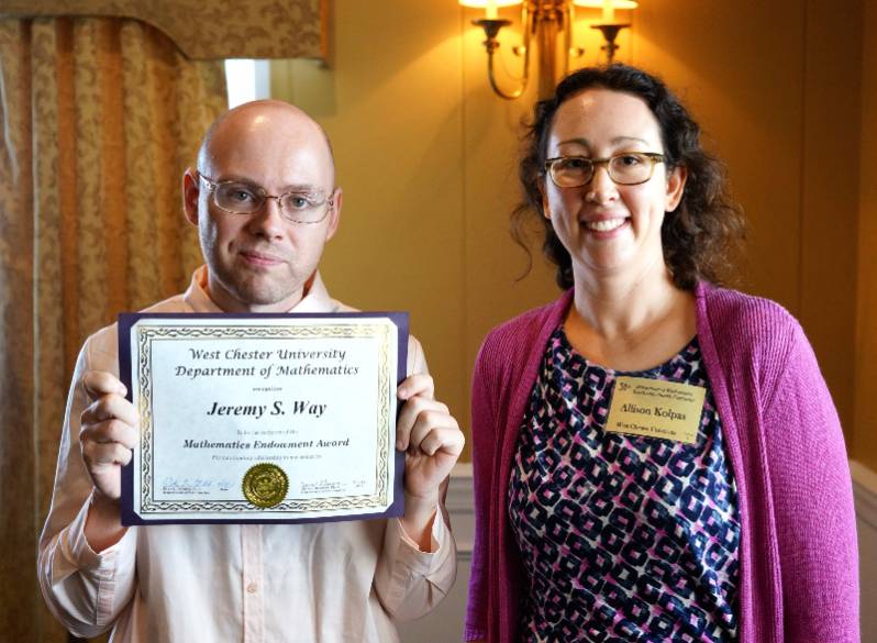 Jeremy Way receiving his award