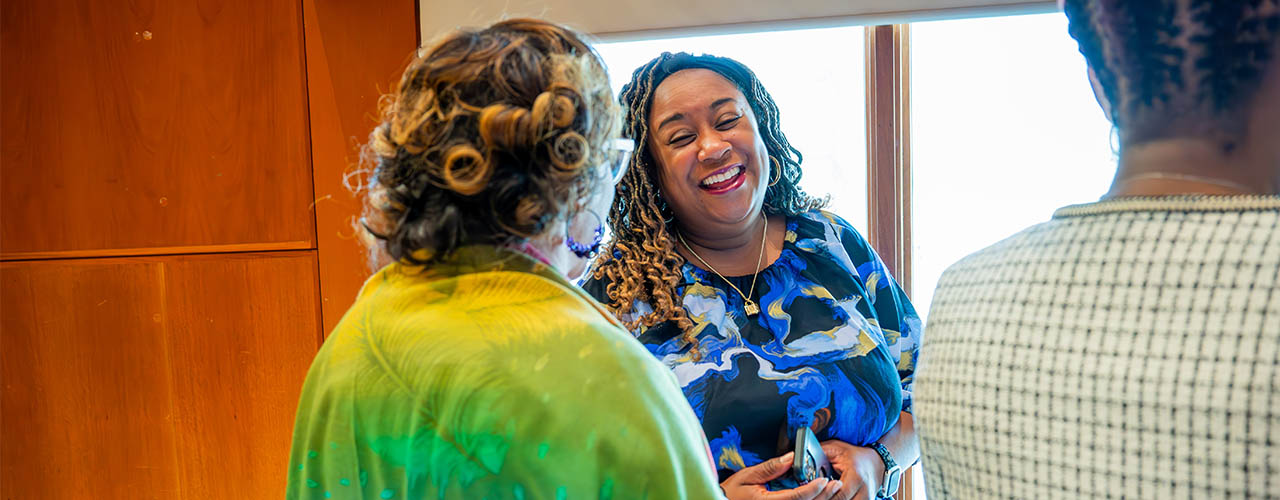 Woman in a conversation smiling